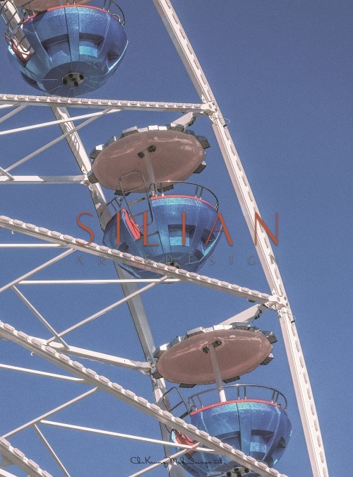The Ferris Wheel Under Blue Sky
